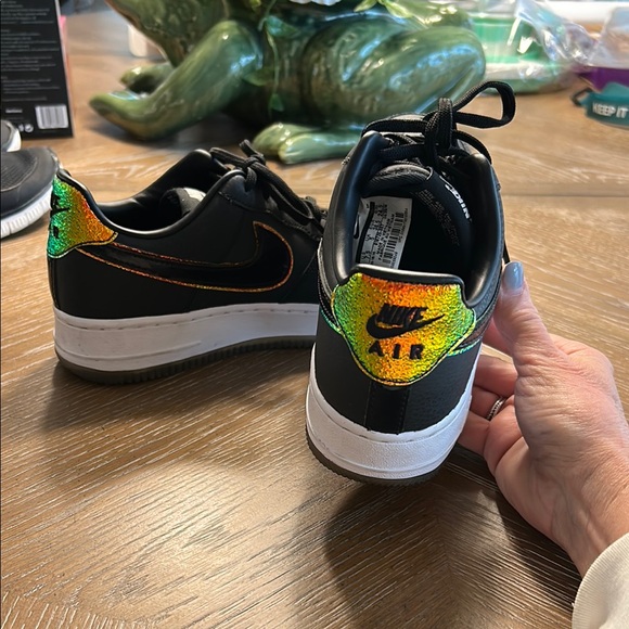 Nike Shoes - Nike Black and Gold Sneakers with Graphic Heel